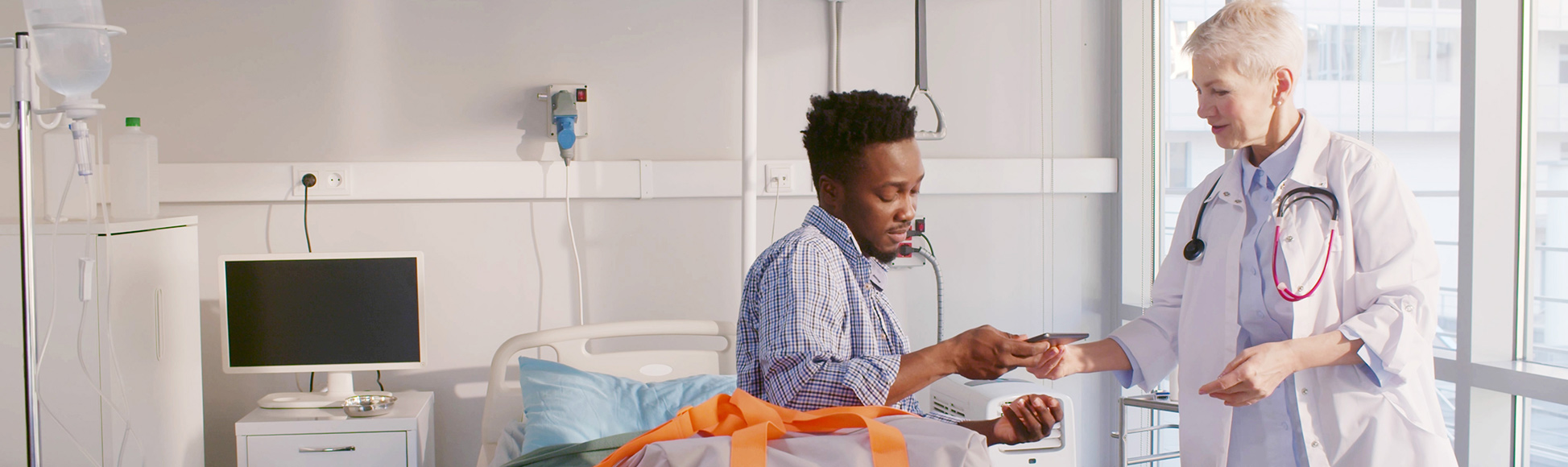 Doctor discharging patient from hospital