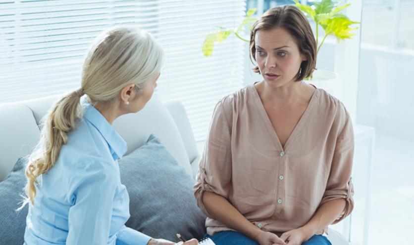 Woman Speaking with Case Manager