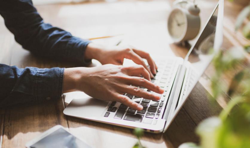 person searching for Coventry provider on computer
