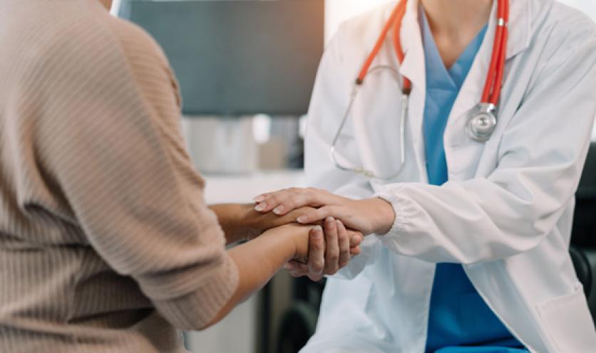 Health care provider comforting patient