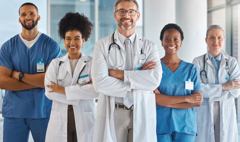 Nurses walking down hallway in hospital